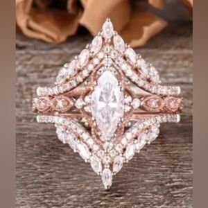 Set of 2  Interlocking Rose Golden Cubic Zirconium Rings